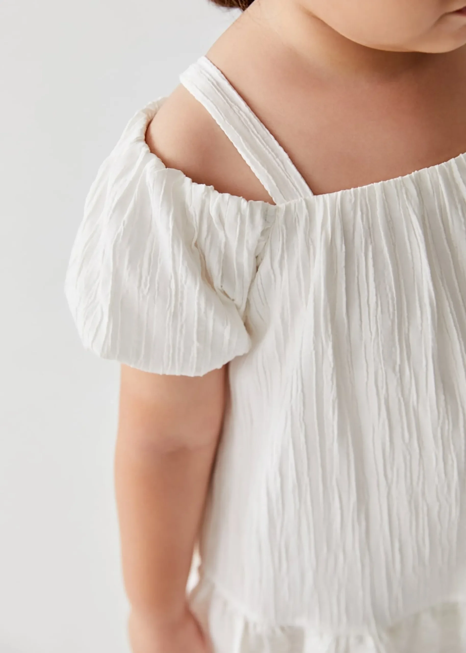 Rieka Ruffle Hem Cold Shoulder Textured Dress